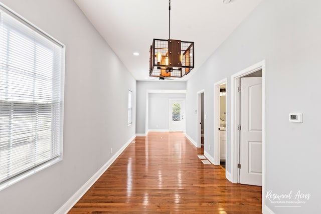 corridor featuring hardwood / wood-style flooring