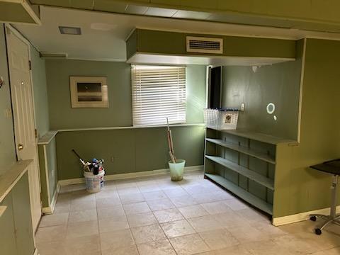 interior space with tile patterned floors