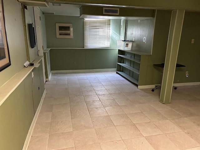 interior space with light tile patterned floors