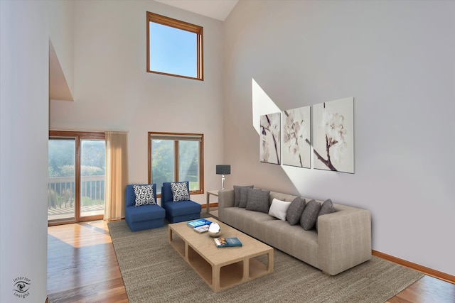 living room with wood-type flooring and a high ceiling