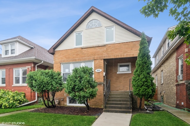 view of front of property featuring a front lawn