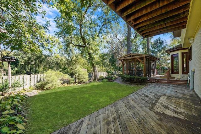 view of yard with a wooden deck and a gazebo