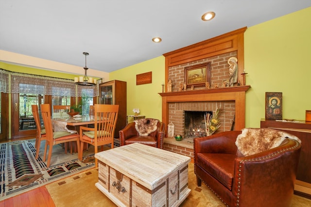 interior space with light wood-type flooring and a fireplace