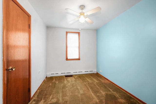 unfurnished room featuring ceiling fan, carpet, and a baseboard heating unit