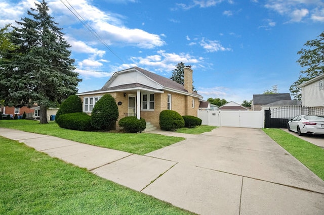 bungalow-style home featuring a front yard