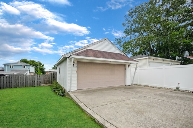 garage with a yard