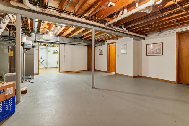 basement featuring water heater