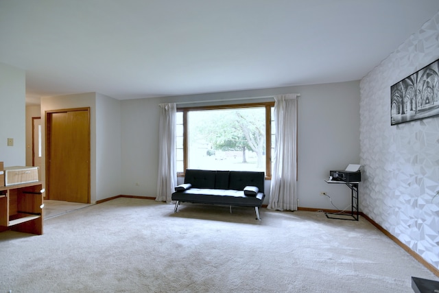 unfurnished room with light colored carpet