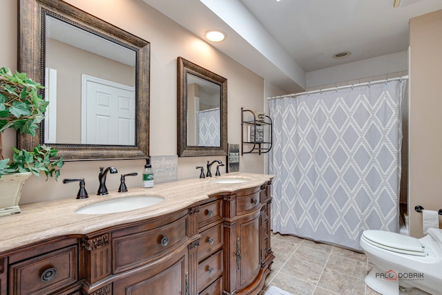 bathroom featuring vanity, tile patterned floors, toilet, and a shower with shower curtain