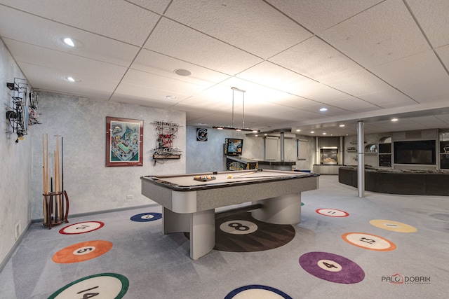 playroom with a drop ceiling and carpet flooring