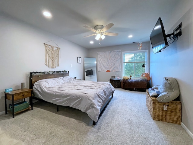 bedroom with ceiling fan and carpet