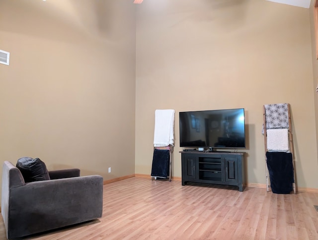 living room with light hardwood / wood-style floors