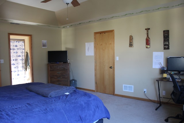 bedroom featuring ceiling fan, carpet flooring, and vaulted ceiling