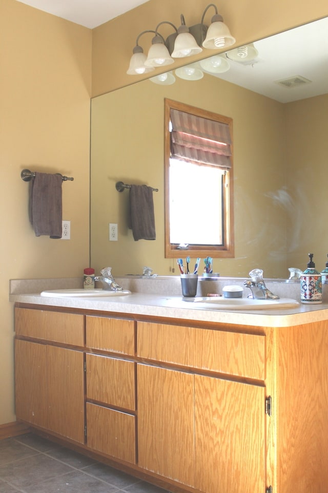 bathroom featuring vanity and tile patterned flooring