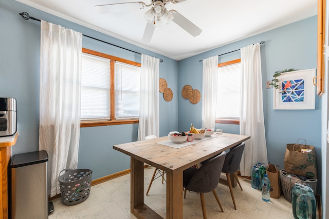 dining space featuring a healthy amount of sunlight and ceiling fan