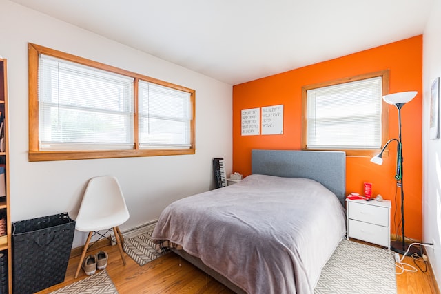 bedroom with light hardwood / wood-style flooring