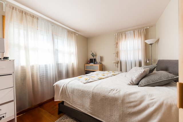 bedroom featuring wood-type flooring