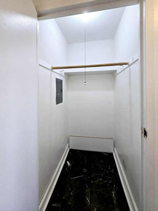 walk in closet with electric panel