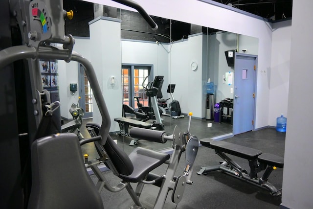 gym with a high ceiling