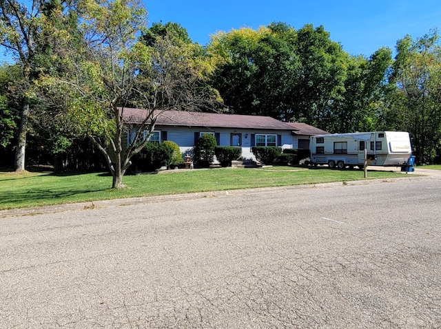 view of front of house with a front lawn