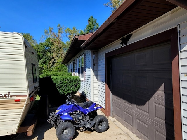 view of home's exterior with a garage