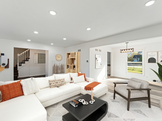 living room with a notable chandelier