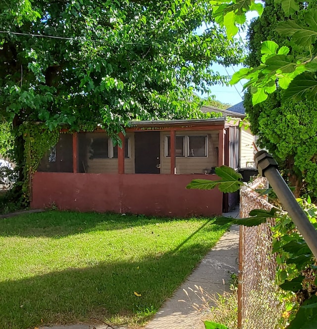 view of front of home with a front yard