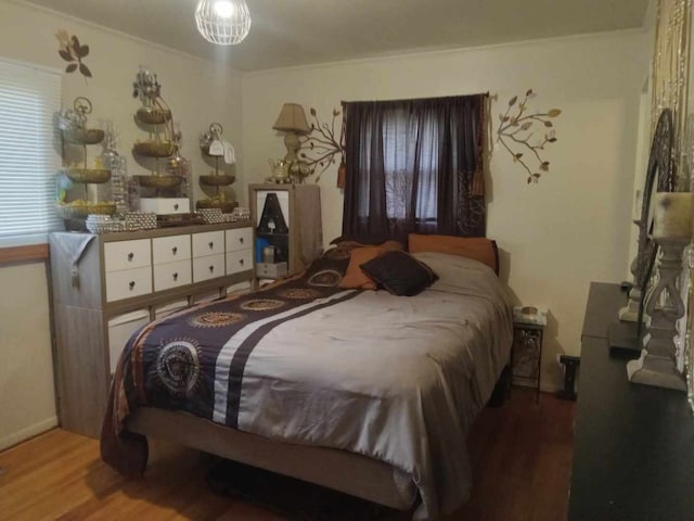 bedroom featuring hardwood / wood-style flooring