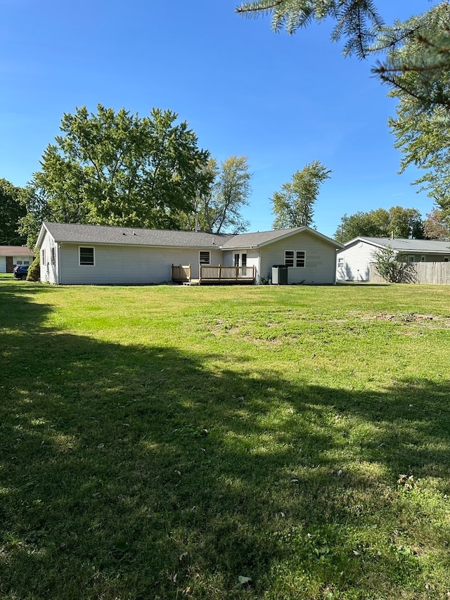 view of yard with a deck