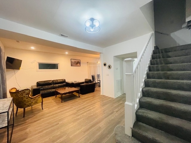 living room with hardwood / wood-style floors