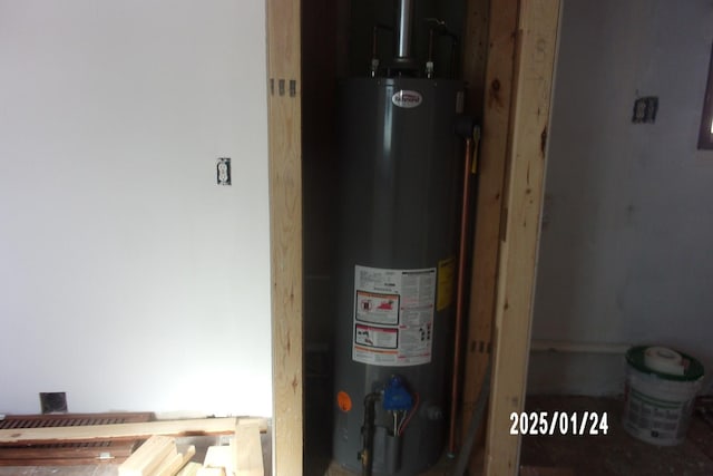 utility room with water heater