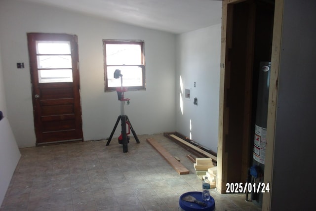 entryway with vaulted ceiling