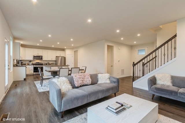 living room featuring wood-type flooring