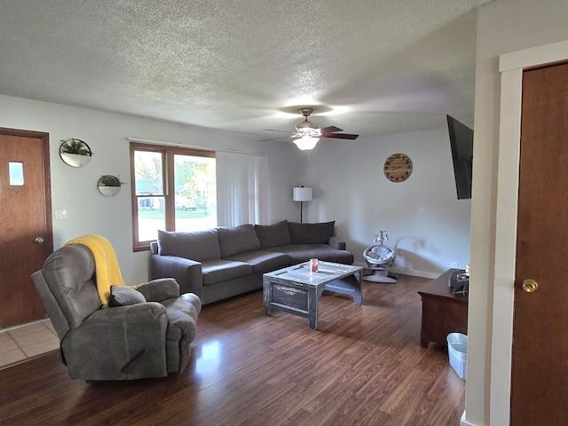 6809 S Joanne Ave, Rochelle, IL 61068 - living area featuring a textured ceiling, wood finished floors, and ceiling fan