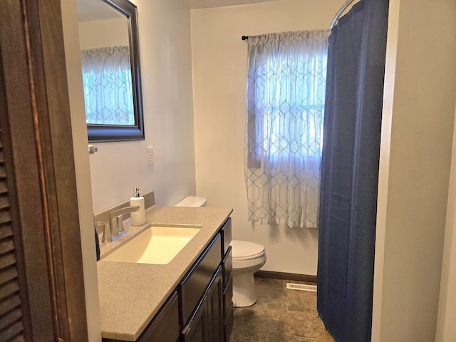 6809 S Joanne Ave, Rochelle, IL 61068 - bathroom featuring toilet and vanity