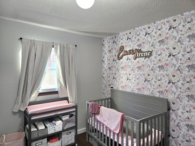 6809 S Joanne Ave, Rochelle, IL 61068 - bedroom with a textured ceiling and wood finished floors