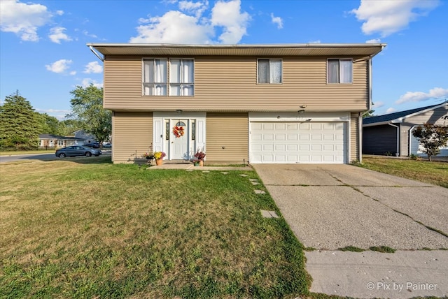 view of front of house featuring a front yard and a garage