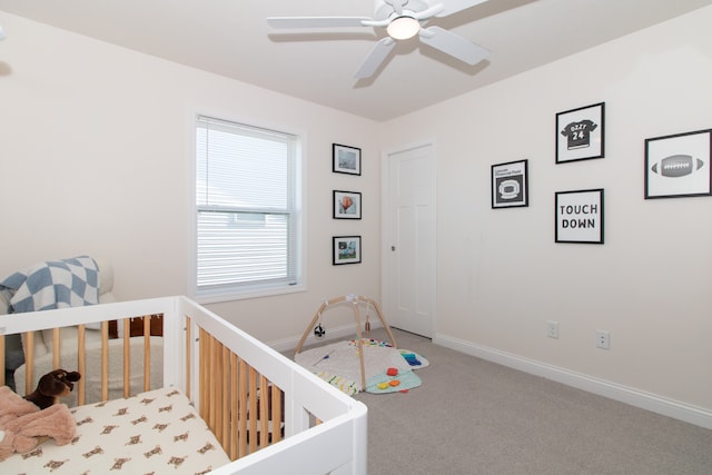 carpeted bedroom featuring ceiling fan