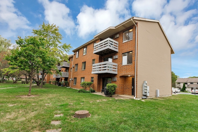 view of building exterior featuring a fire pit