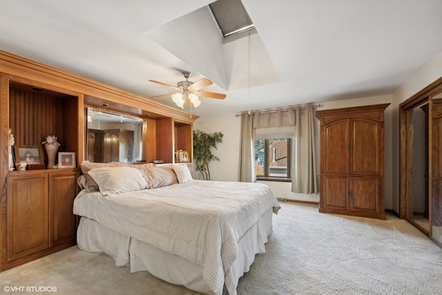 bedroom featuring light colored carpet and ceiling fan