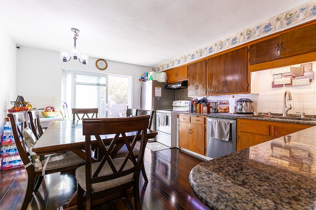 kitchen featuring decorative backsplash, dark wood-type flooring, white electric range oven, stainless steel dishwasher, and sink