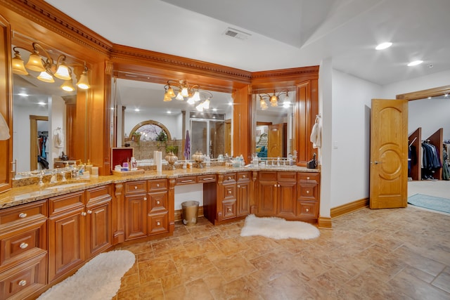 bathroom with vanity and an enclosed shower