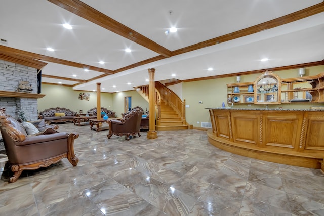 reception featuring a stone fireplace and decorative columns