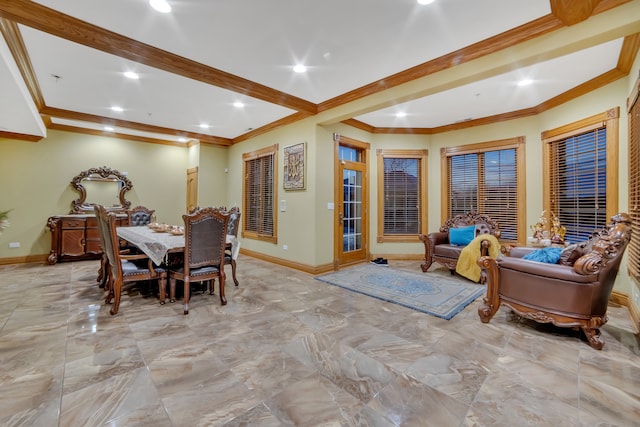 dining space featuring crown molding