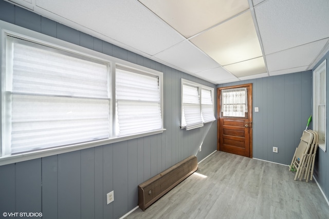 interior space featuring a paneled ceiling