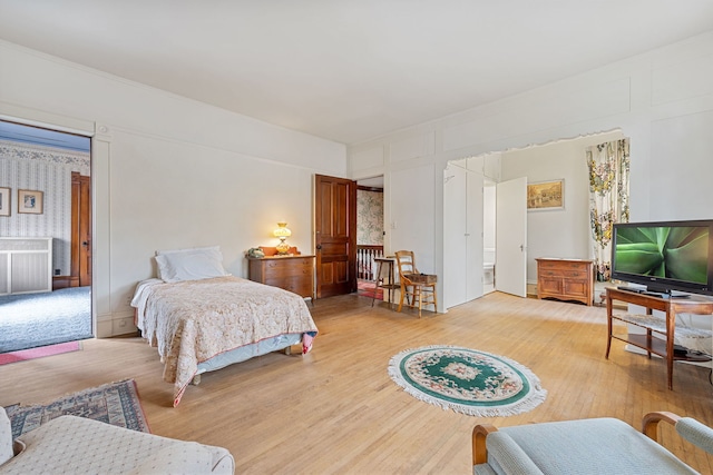 bedroom with wood-type flooring