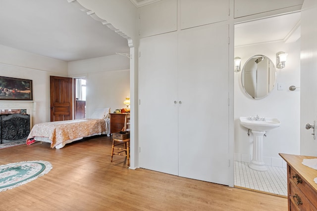 bedroom with light wood-type flooring