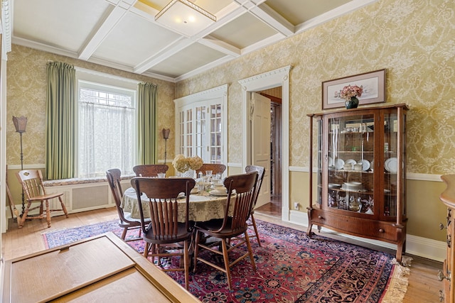 dining room with wood-type flooring, beamed ceiling, and coffered ceiling