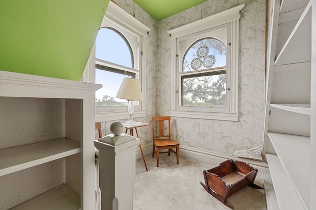 living area with light colored carpet