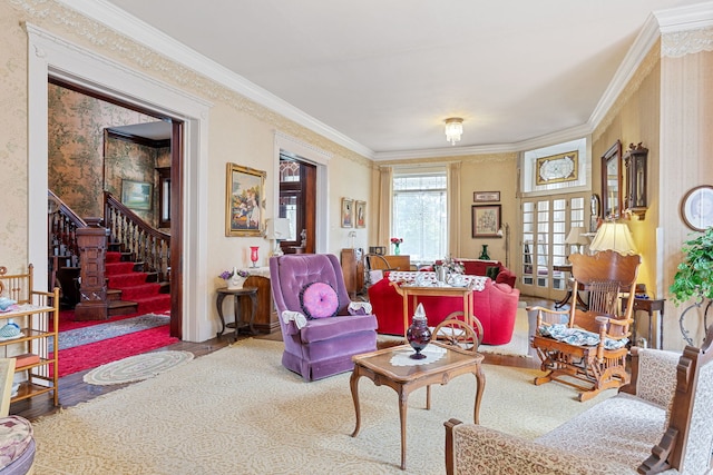 living room featuring french doors and crown molding